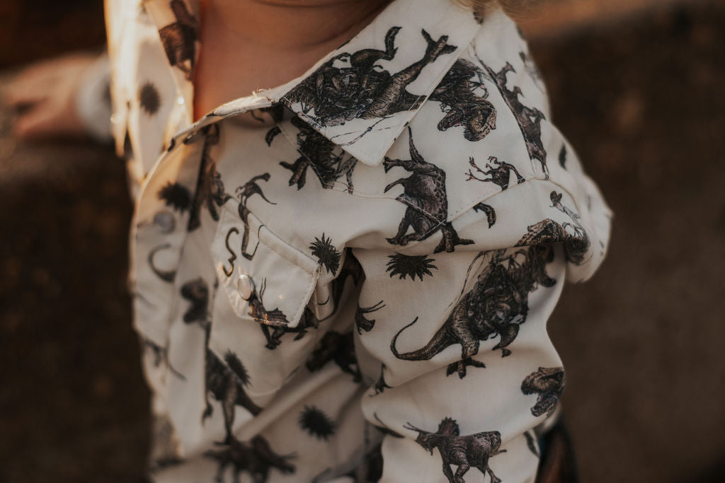 Cowboy Dino Long Sleeve Pearl Snap Onesie
