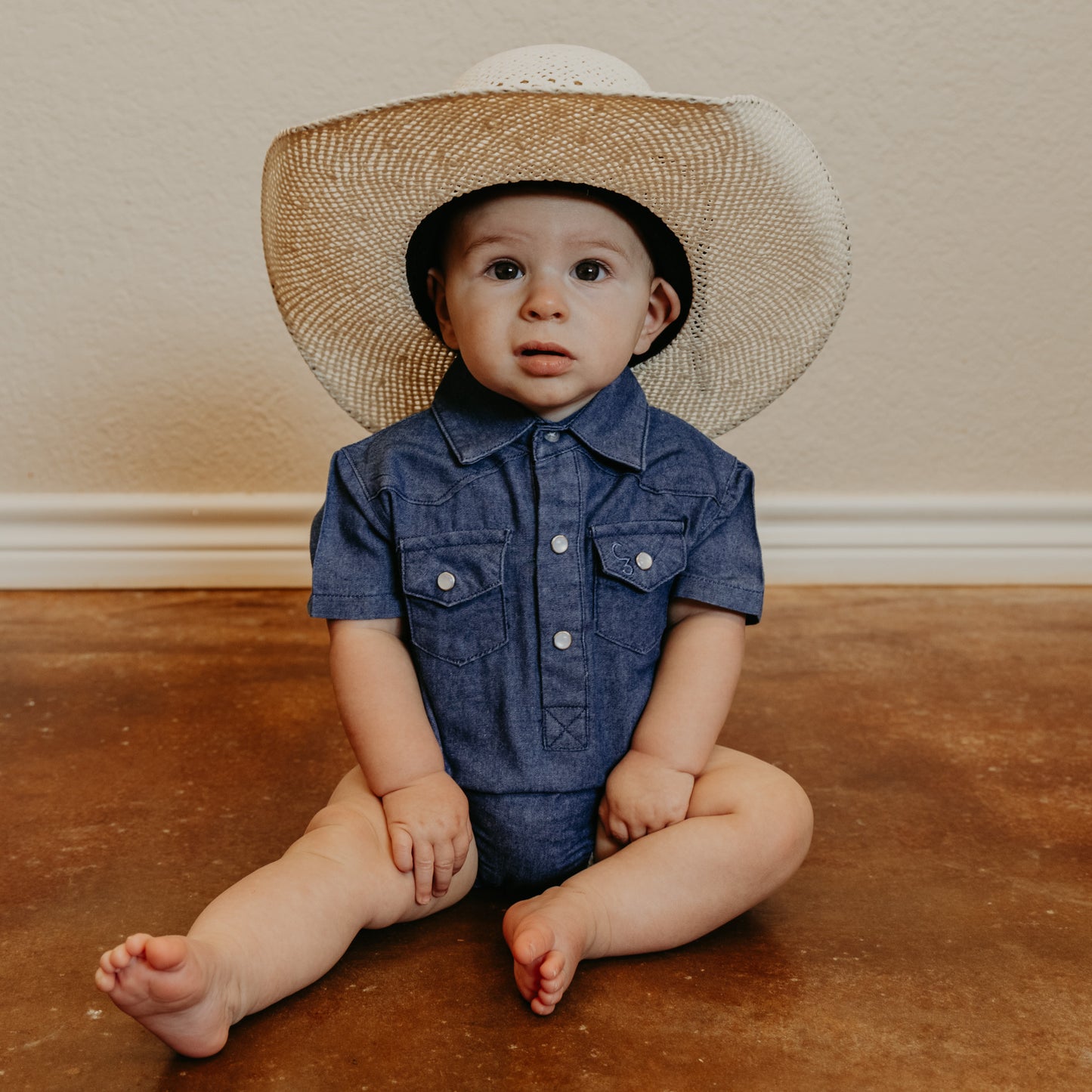 Dark Denim Short Sleeve Pearl Snap Onesie