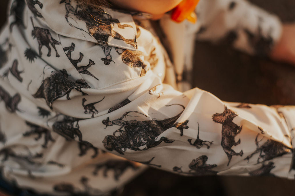 Cowboy Dino Long Sleeve Pearl Snap Onesie